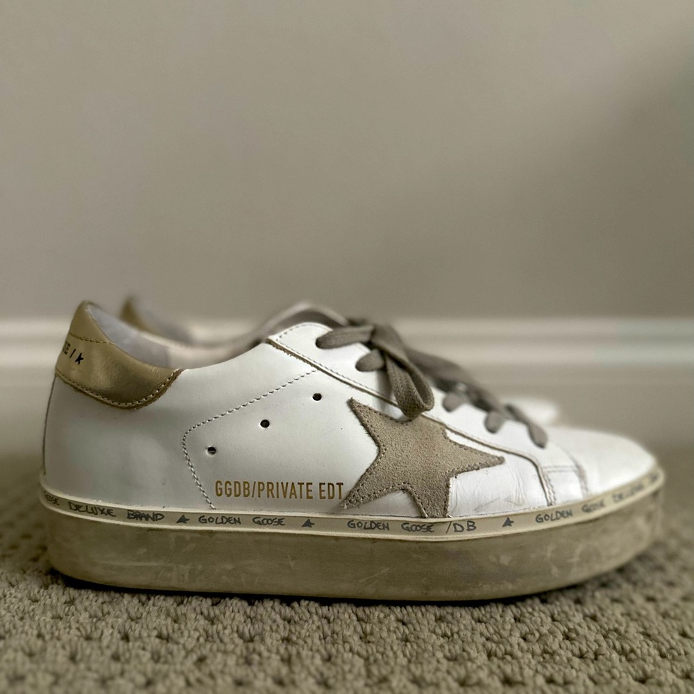 Golden Goose Hi Star white leather platform sneakers.